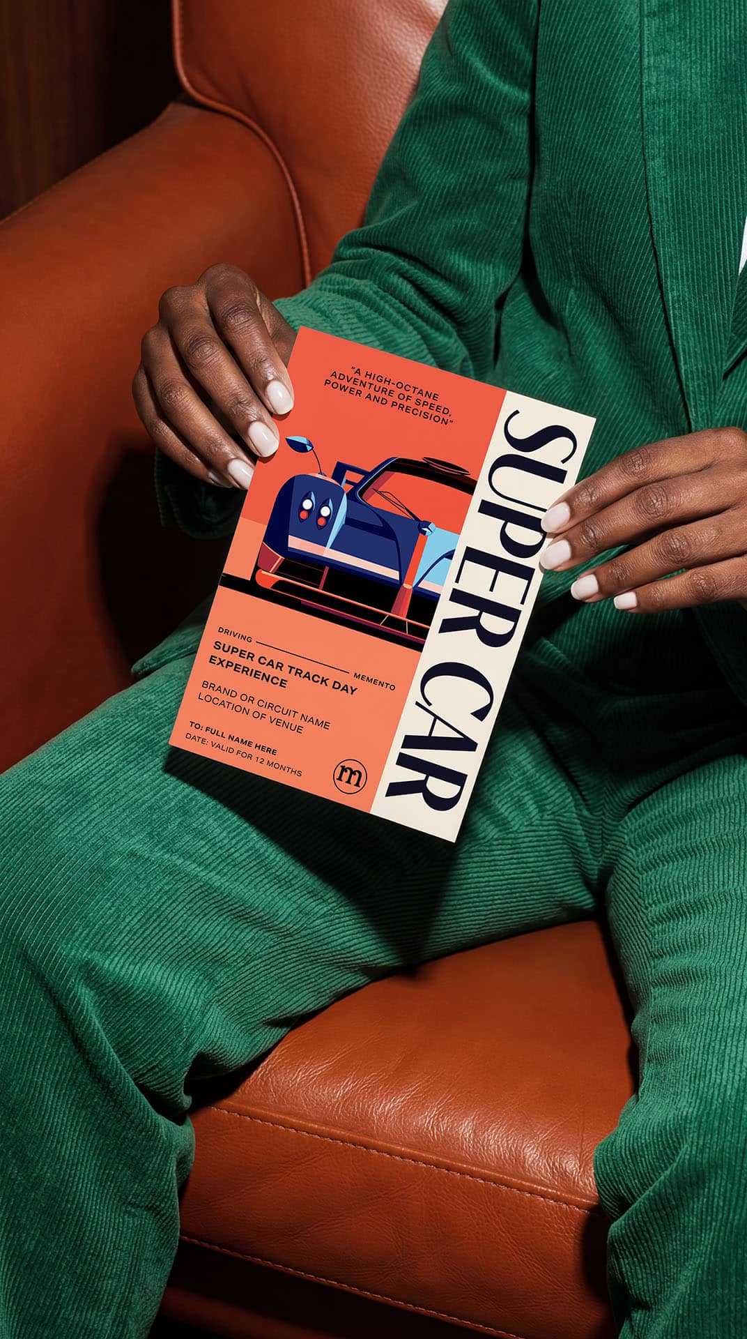 A personalised Momeo Supercar Driving keepsake ticket held in hand.